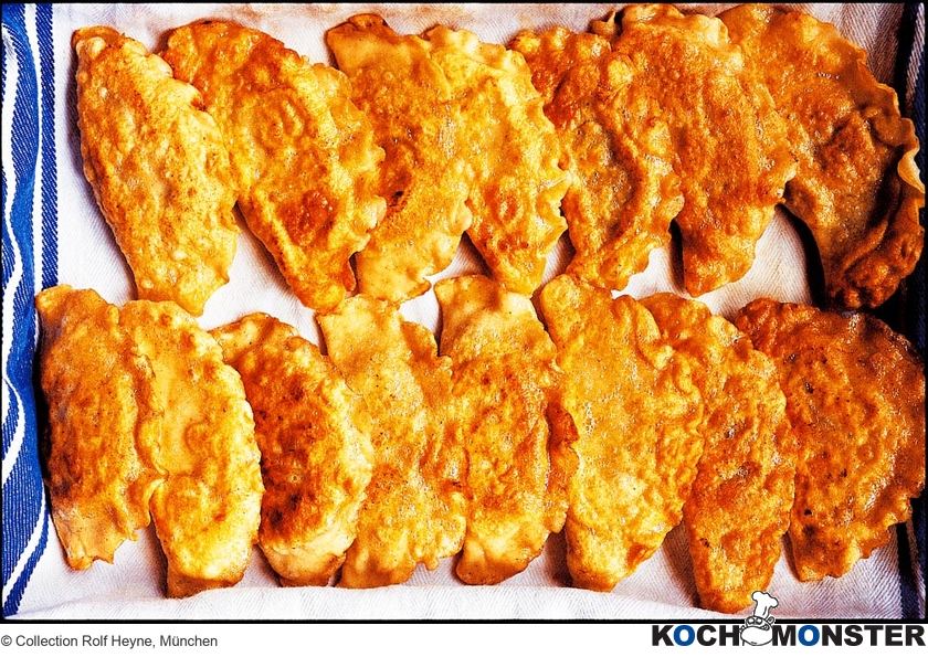 Piroggen mit Sauerkraut, Champignons und Dörrpflaumen
Foto (c) Collection Rolf Heyne, München
(stark reduzierte Bildqualität) Piroggen mit Sauerkraut, Champignons und Dörrpflaumen