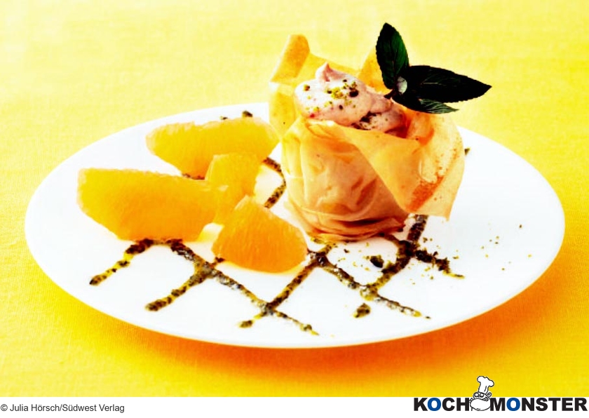 Knusprige Teigkörbchen mit Pflaumen-Brandy-Sahne
Foto (c) Julia Hörsch/Südwest Verlag
(stark reduzierte Bildqualität) Knusprige Teigkörbchen mit Pflaumen-Brandy-Sahne